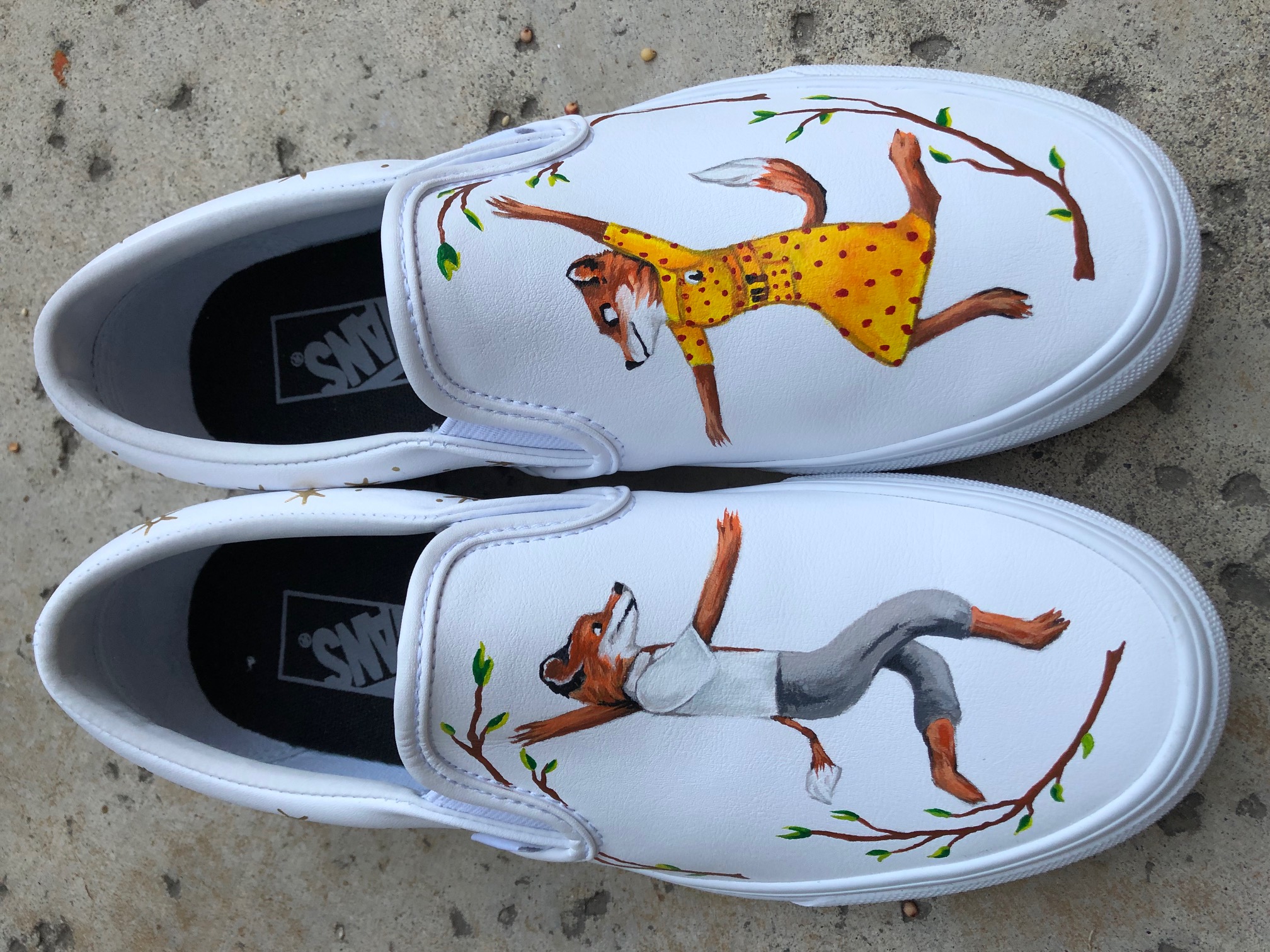 White shoes with fox designs